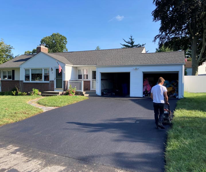 Smooth residential asphalt driveway after professional paving in Cranston, RI