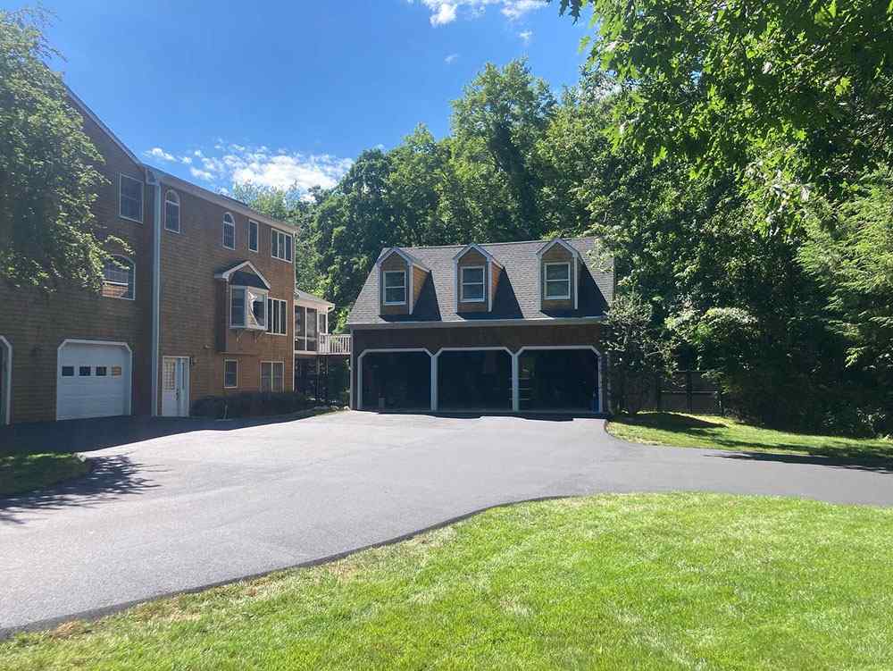 Residential asphalt driveway paving project in Cranston, Rhode Island