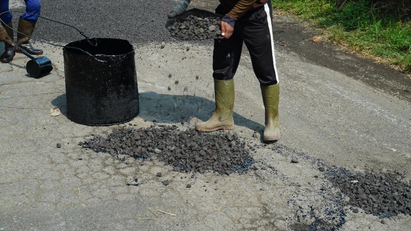 Surface Leveling During Asphalt Driveway Maintenance in Cranston, RI & Nearby Areas