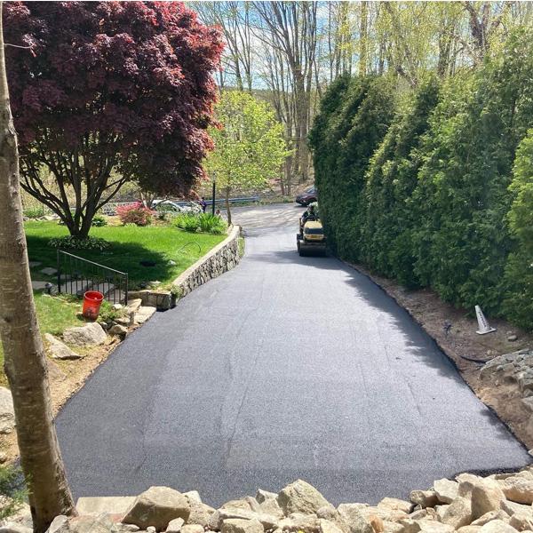 John Cooper Asphalt Paving Team Delivering Professional Asphalt Services