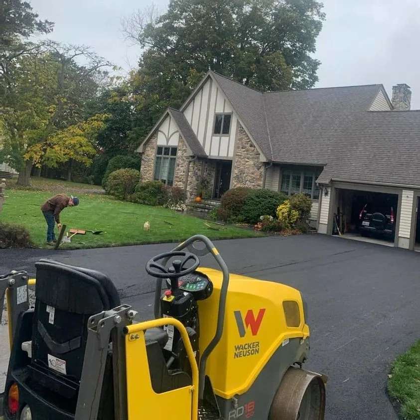 Freshly Repaved Asphalt Driveway by John Cooper Asphalt Paving in Cranston, RI