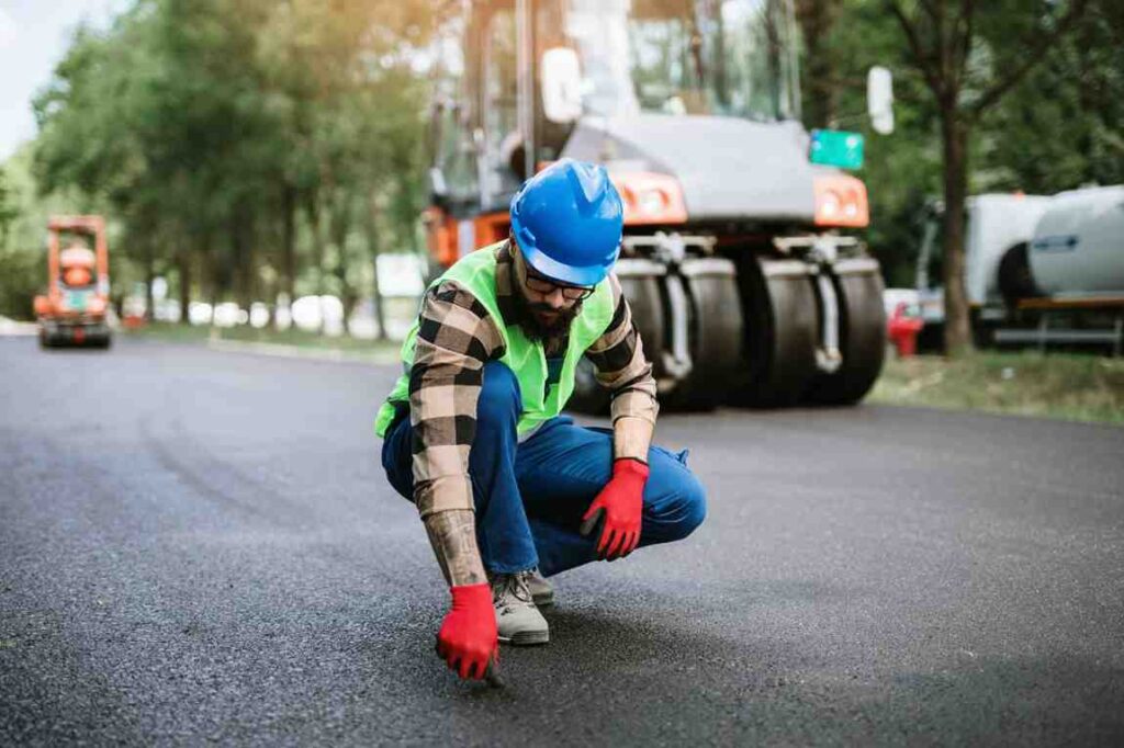 Industrial Asphalt Surface Undergoing Summer Maintenance and Crack Sealing by Cooper Paving